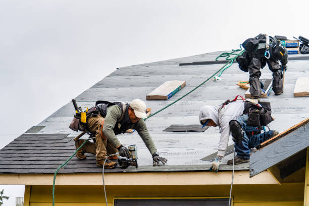 Professional Gutter Installation technician working in Monessen, PA